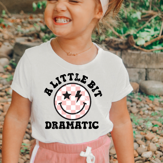 Retro kids graphic tee in natural color with a touch of drama.